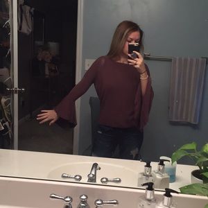 Maroon sweater with ruffled sleeves